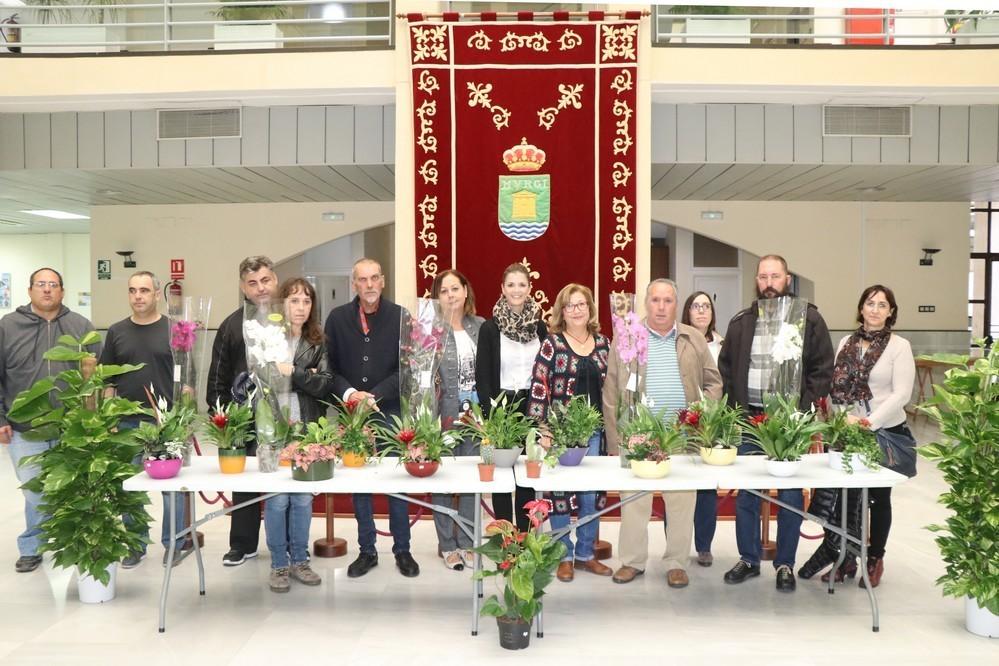 Cerca de una veintena de usuarios muestran el trabajo que han realizado durante el año en el Taller de Jardinería de Salud Mental